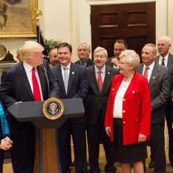 President Donald Trump congratulates Alabama Gov. Kay Ivey in person Wednesday, April 26, 2017, in Washington, D.C., when she joined him and other government leaders at the White House for the signing of an executive order. Ivey was on hand as President Trump signed the "Education Federalism Executive Order." It aims to reduce the federal governments role in K-12 education.