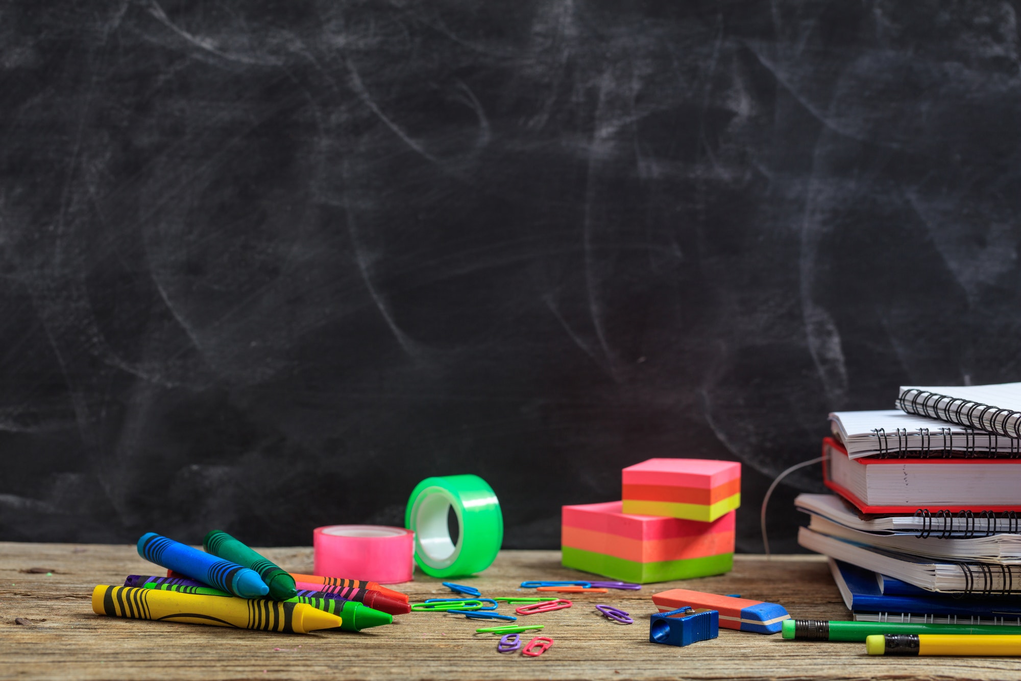 School supplies on a wooden desk