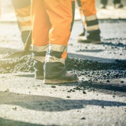 Teamwork, Group of workers on a road construction, team of people at work