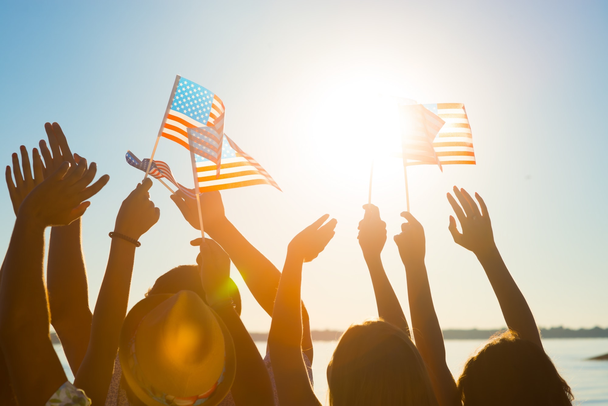 Crowd of waving American flags.